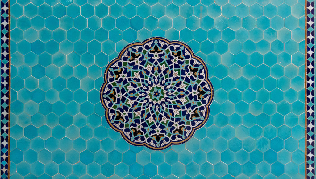 Photo of blue tiles at the Jame Mosque in Yazd, Iran. Photo by Mansour Kiaei.