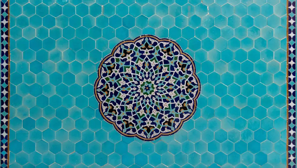 Photo of blue tiles at the Jame Mosque in Yazd, Iran. Photo by Mansour Kiaei.