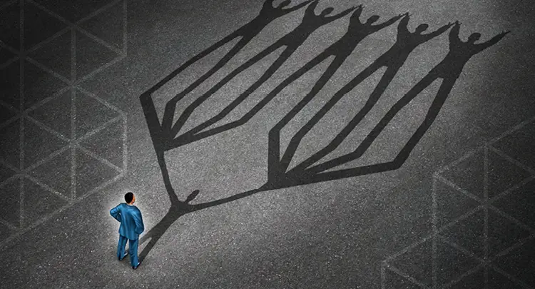 Illustration of a business man standing at the base of a silhouette of many other team members, representing the concept of power