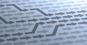 Illustration of arrows pointing in the same direction, some lighter in color than others