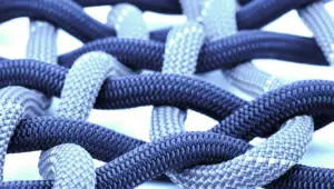 Close-up photo of blue cords woven together