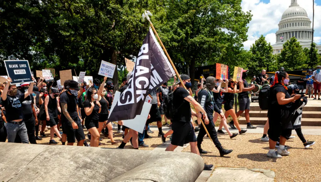 Photo: Black Out March social justice movement in protest against police brutality leaves the United States Capitol on Independence Day, 2020