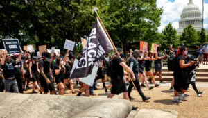 Photo: Black Out March social justice movement in protest against police brutality leaves the United States Capitol on Independence Day, 2020