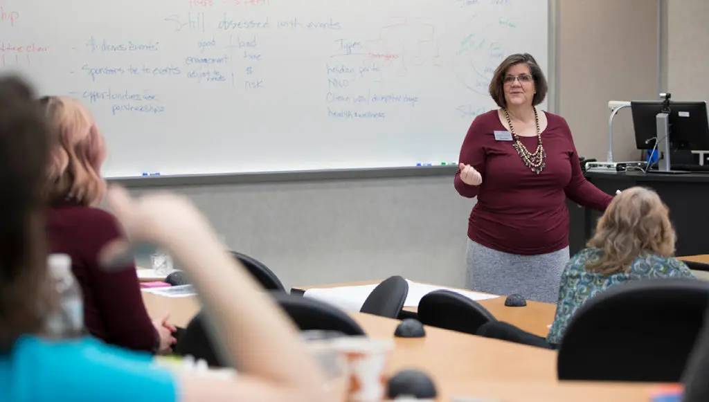 Photo of Tamela Spicer leading a training workshop