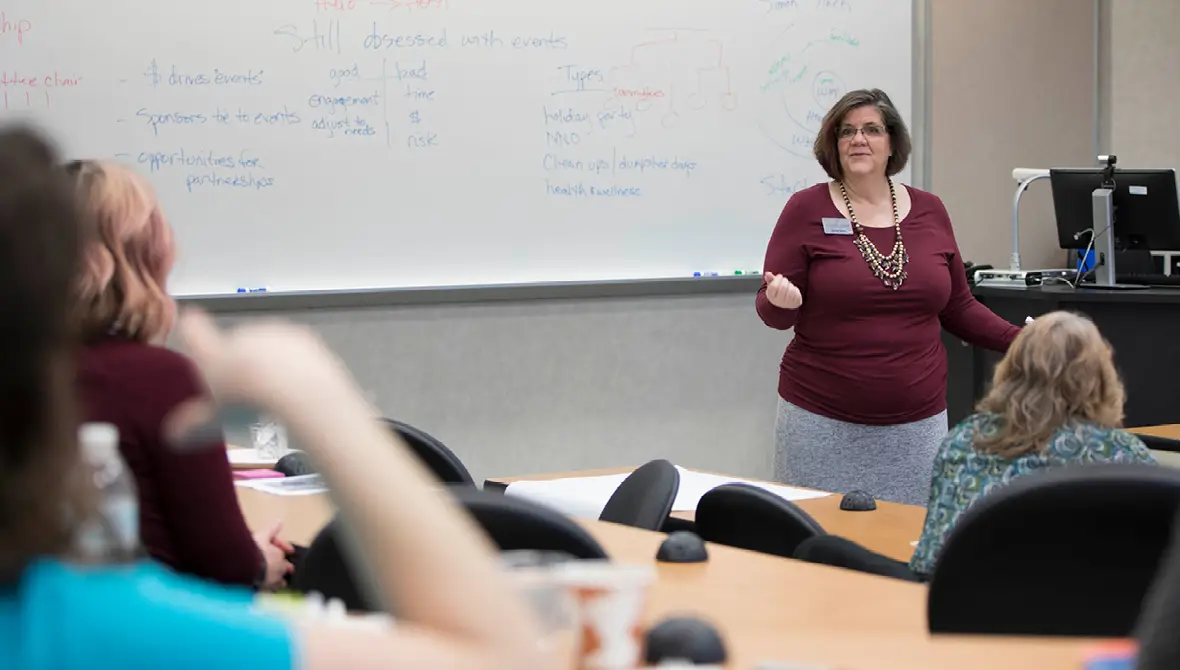 Photo of Tamela Spicer leading a training workshop