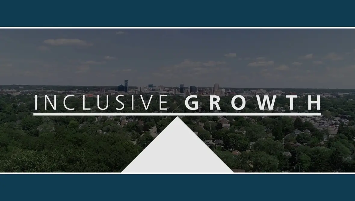 Image: The words "Inclusive Growth" appear over a photo of the downtown skyline of Grand Rapids, Michigan
