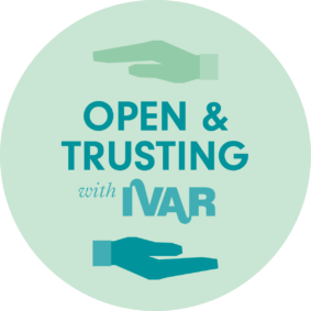 Light green, circular badge with the words "Open & Trusting with IVAR" in the center