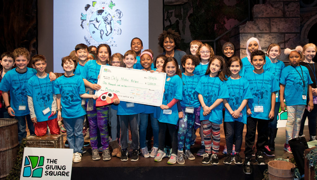 A photo of a group of children in philanthropy, courtesy of The Giving Square