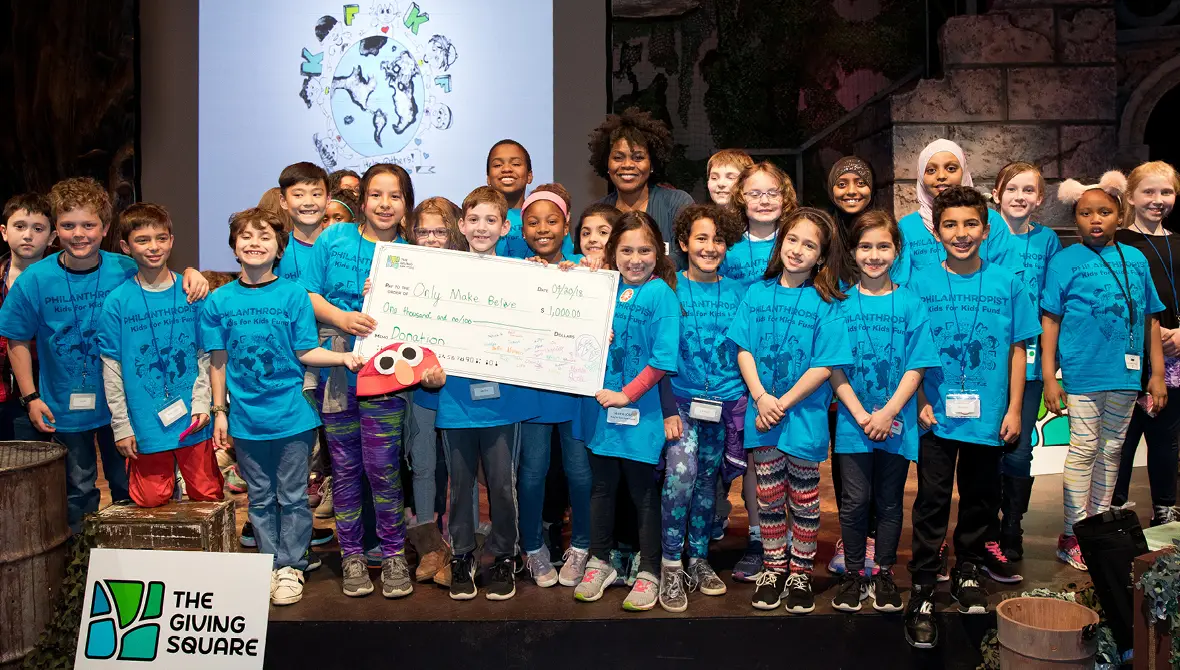 A photo of a group of children in philanthropy, courtesy of The Giving Square