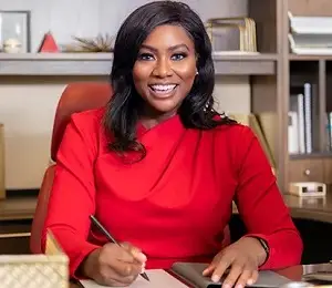 Photo of Marsha Morgan, a Black woman with shoulder-length hair wearing a red blouse.
