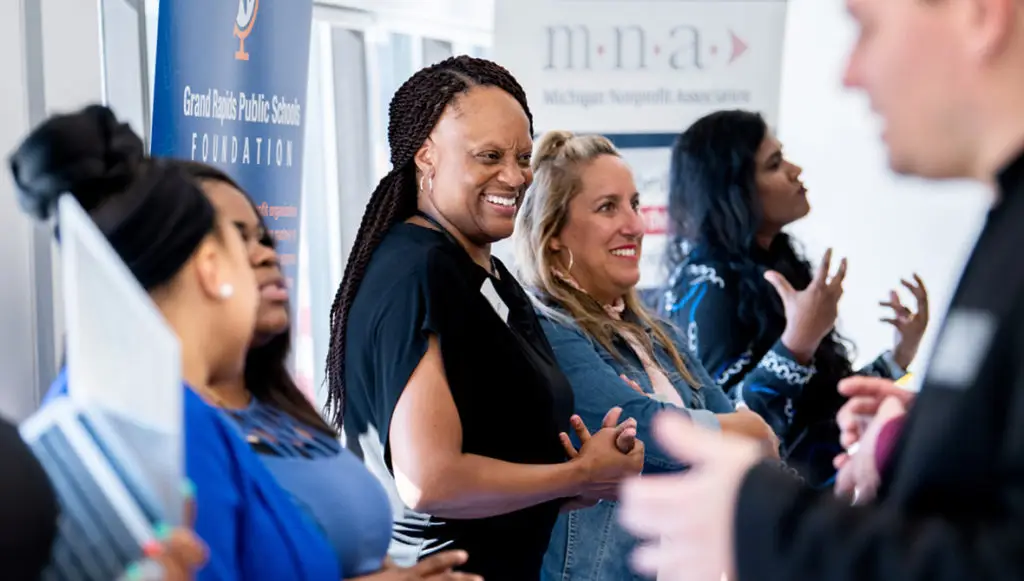 Photo of several attendees of the Nonprofit Board Connect event on August 10, 2022 at the Grand Rapids Chamber.