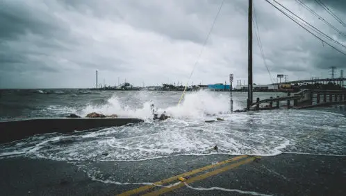 Photo of floodwater rusing over the streets in Kemah, Texas, during Hurricane Harvey in 2017.
