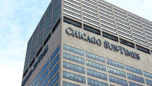 Photo of the Chicago Sun-Times building in downtown Chicago. The Sun-Times is one example of a for-profit news outlet that has been acquired by a nonprofit media organization (Chicago Public Media).