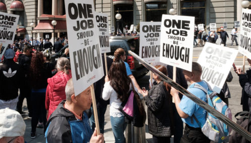 Photo of dozens of union-represented hotel workers protest outside of the J.W. Marriott's Westin St. Francis hotel in San Francisco's Union Square on Labor Day, 2018. (photo represents the concept of unionization)