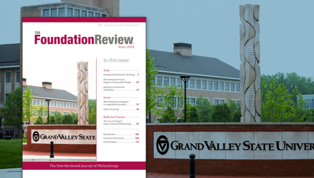 Front cover of The Foundation Review, volume 14, issue 3. The cover photo shows a new limestone sculpture called “Earth Totem” by local Anishinaabe artist Jason Quigno on Grand Valley State University's Pew Campus in downtown Grand Rapids, Mich.