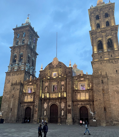 An ornate brick church in Puebla, Mexico