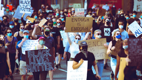 Protesters march in Washington, D.C. at a Justice for George Floyd event in 2020.