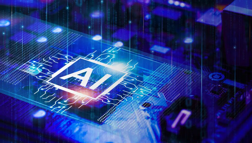 Futuristic image of a computer circuitboard featuring the glowing letters "AI"