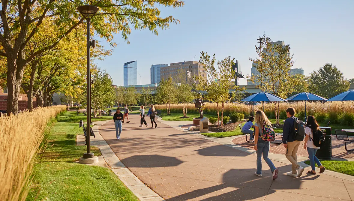 Photo of students walking in front of L. William Seidman Center on GVSU's downtown Grand Rapids campus